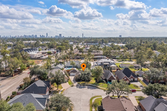 7903 S Wellington Ct, Houston, TX 77055 - aerial perspective of suburban area with city skyline