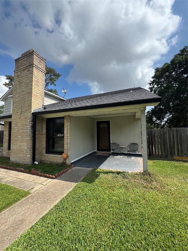 20806 Park Ridge Ct, Katy, TX 77450 - view of front of home featuring a chimney and roof with shingles