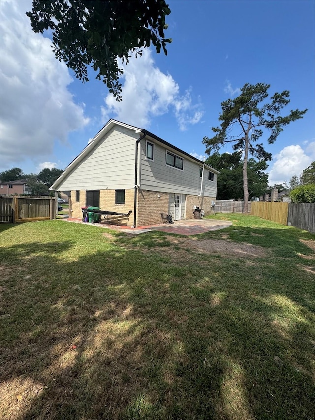 20806 Park Ridge Ct, Katy, TX 77450 - rear view of property featuring a patio and brick siding