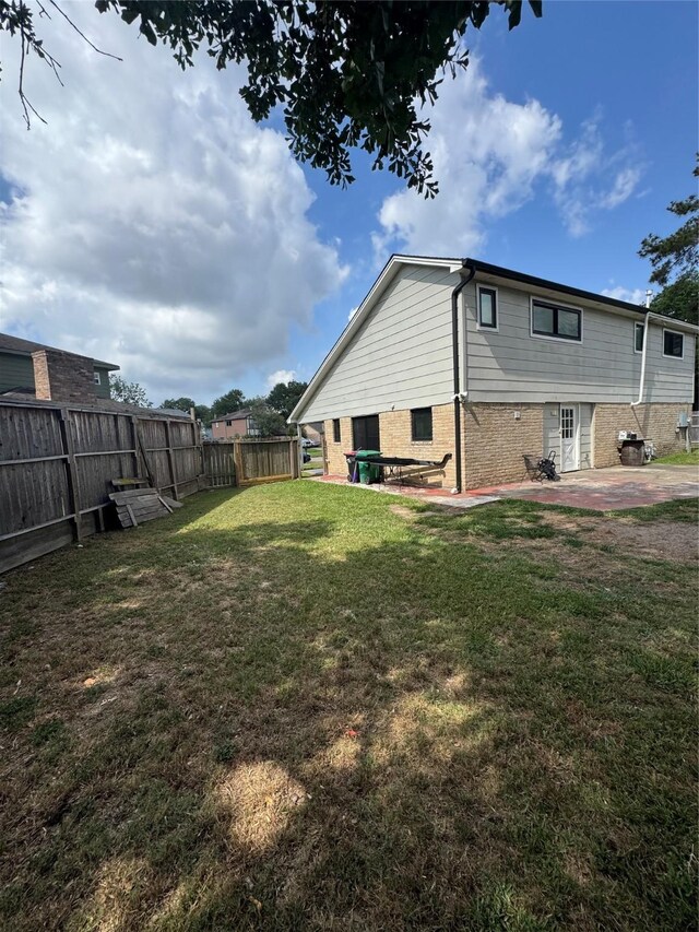 20806 Park Ridge Ct, Katy, TX 77450 - rear view of property featuring a patio area and brick siding