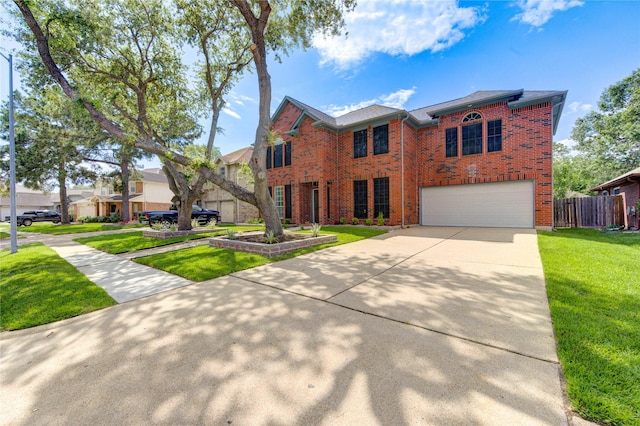 13727 Sablegarden Ln, Houston, TX 77014 - view of front of home with brick siding, concrete driveway, and a garage