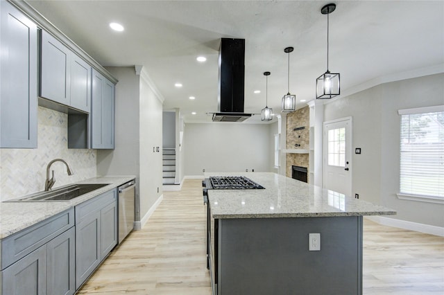 13727 Sablegarden Ln, Houston, TX 77014 - kitchen with a sink, gray cabinetry, stainless steel dishwasher, a kitchen island, and wall chimney range hood