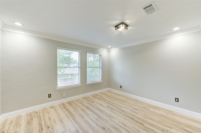 13727 Sablegarden Ln, Houston, TX 77014 - empty room with ornamental molding, light wood finished floors, baseboards, and recessed lighting