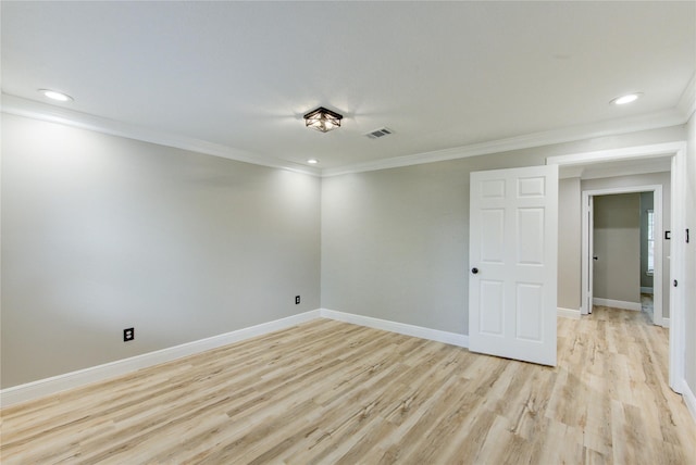 13727 Sablegarden Ln, Houston, TX 77014 - empty room with light wood finished floors, ornamental molding, baseboards, and recessed lighting