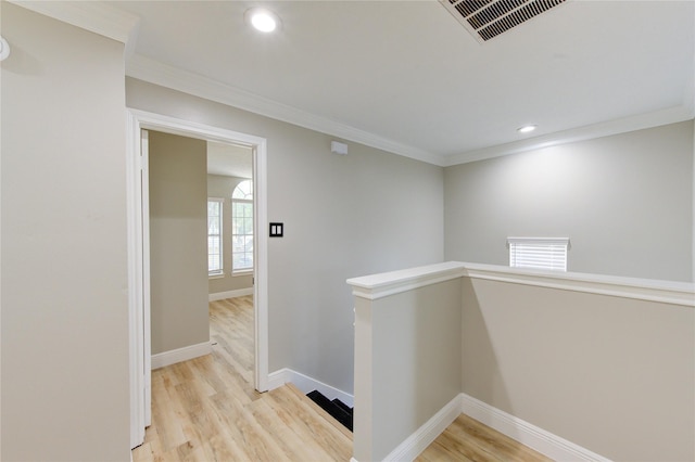 13727 Sablegarden Ln, Houston, TX 77014 - corridor with an upstairs landing, light wood-style floors, ornamental molding, baseboards, and recessed lighting