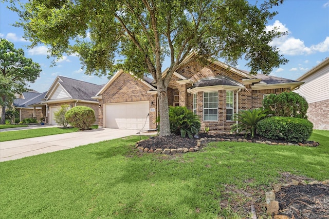 12427 Adams Ridge Ln, Humble, TX 77346 - traditional-style home featuring brick siding, a garage, concrete driveway, and a front lawn