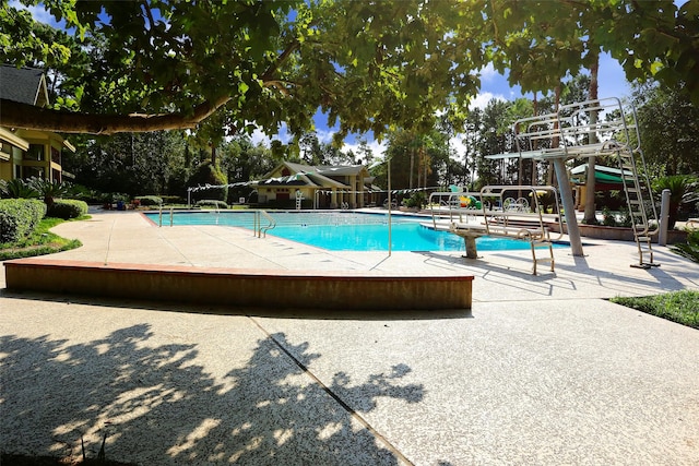 12427 Adams Ridge Ln, Humble, TX 77346 - community pool with a patio