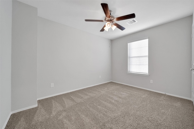 13854 Rock Island Trl, Conroe, TX 77384 - carpeted empty room with a ceiling fan and baseboards