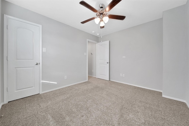 13854 Rock Island Trl, Conroe, TX 77384 - carpeted spare room with ceiling fan and baseboards