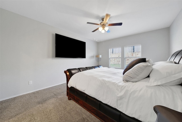 13854 Rock Island Trl, Conroe, TX 77384 - carpeted bedroom with baseboards and a ceiling fan