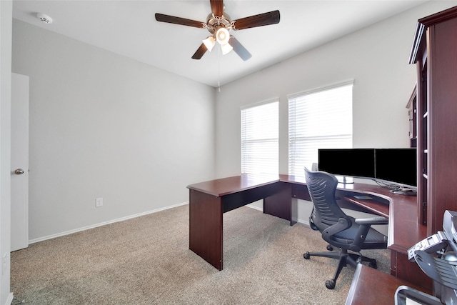 13854 Rock Island Trl, Conroe, TX 77384 - home office featuring a ceiling fan, carpet flooring, and baseboards