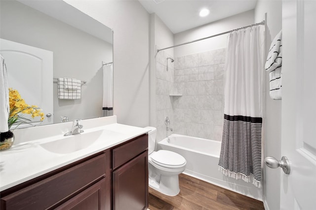 13854 Rock Island Trl, Conroe, TX 77384 - bathroom with vanity, wood finished floors, toilet, and shower / tub combo