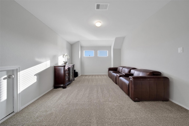 13854 Rock Island Trl, Conroe, TX 77384 - living area featuring light colored carpet, baseboards, and vaulted ceiling