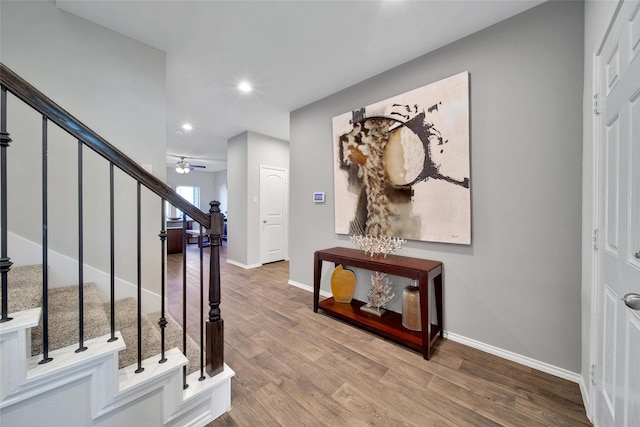 13854 Rock Island Trl, Conroe, TX 77384 - foyer entrance with stairway, recessed lighting, wood finished floors, baseboards, and ceiling fan
