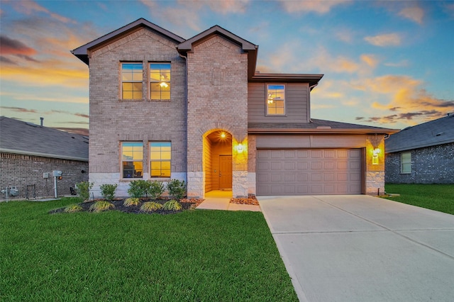 13854 Rock Island Trl, Conroe, TX 77384 - view of front of home featuring driveway, stone siding, and a front yard