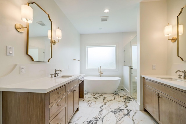2006 Chantilly Ln, Houston, TX 77018 - bathroom with two vanities, a freestanding tub, marble finish flooring, and a stall shower