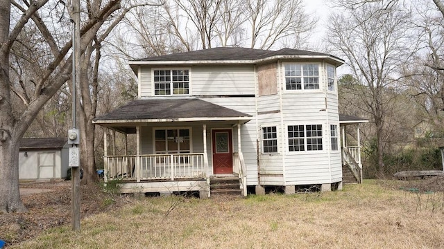 215 Wildwood Ln, Point Blank, TX 77364 - traditional home featuring a porch and a shingled roof