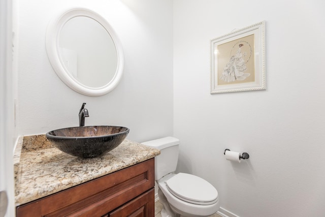 13422 Great Creek Dr, Pearland, TX 77584 - half bathroom with vanity, toilet, and baseboards