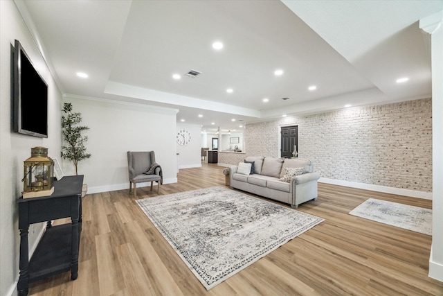 2007 Ottawa Ln, Houston, TX 77043 - living room featuring a tray ceiling, baseboards, light wood-type flooring, and recessed lighting