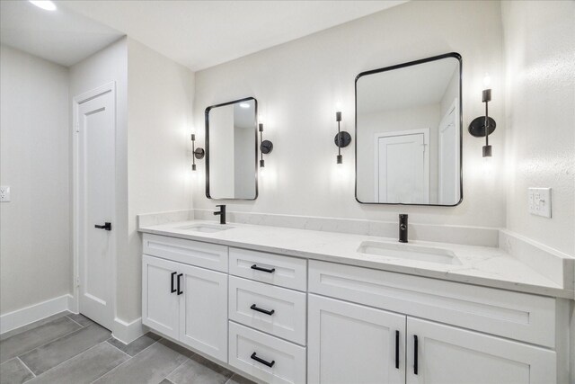 2007 Ottawa Ln, Houston, TX 77043 - full bathroom with double vanity and baseboards