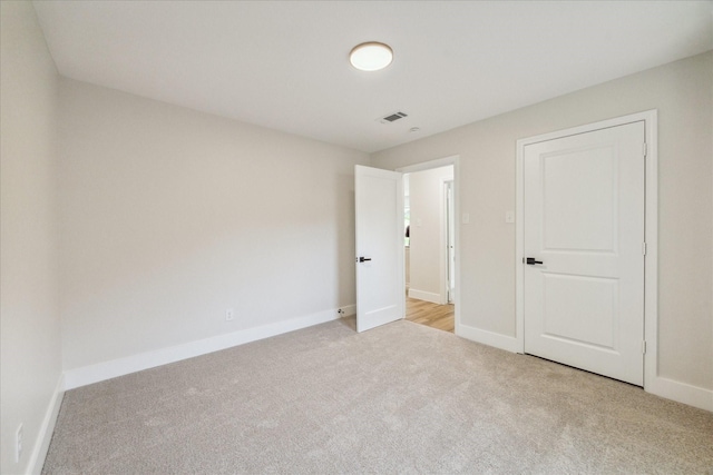 2007 Ottawa Ln, Houston, TX 77043 - unfurnished bedroom featuring light carpet and baseboards