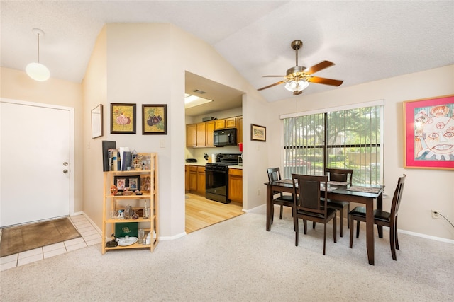 2711 Grants Lake Blvd Unit 144, Sugar Land, TX 77479 - dining space featuring light carpet, lofted ceiling, ceiling fan, and baseboards