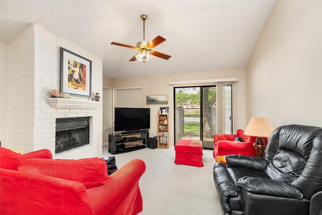 2711 Grants Lake Blvd Unit 144, Sugar Land, TX 77479 - living area featuring carpet flooring, ceiling fan, and a brick fireplace