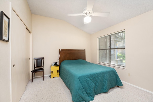2711 Grants Lake Blvd Unit 144, Sugar Land, TX 77479 - bedroom featuring lofted ceiling, a closet, baseboards, ceiling fan, and light colored carpet