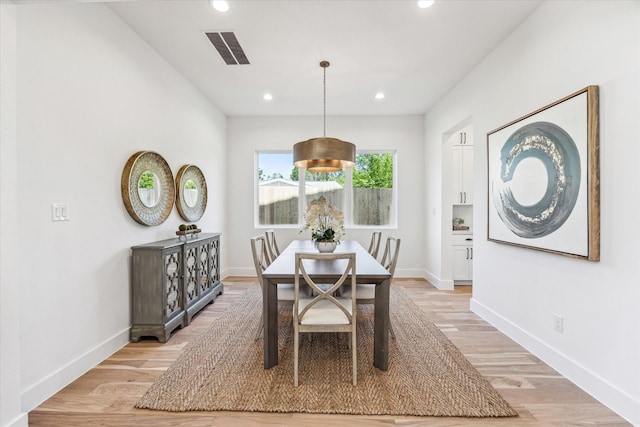 1707 Nina Lee Ln, Houston, TX 77018 - dining space with light wood finished floors, baseboards, and recessed lighting