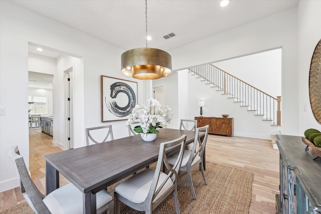 1707 Nina Lee Ln, Houston, TX 77018 - dining area featuring stairs, light wood-style flooring, recessed lighting, and baseboards