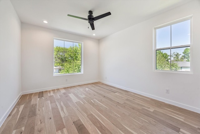 1707 Nina Lee Ln, Houston, TX 77018 - empty room with light wood-style flooring, ceiling fan, baseboards, and recessed lighting