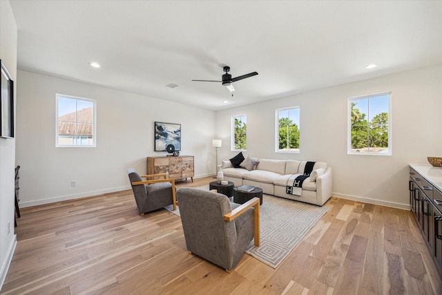 1707 Nina Lee Ln, Houston, TX 77018 - living area featuring healthy amount of natural light, light wood-type flooring, baseboards, a ceiling fan, and recessed lighting