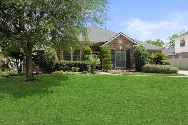 527 Oak Ridge Grove Cir, Spring, TX 77386 - view of front of property with brick siding and a shingled roof