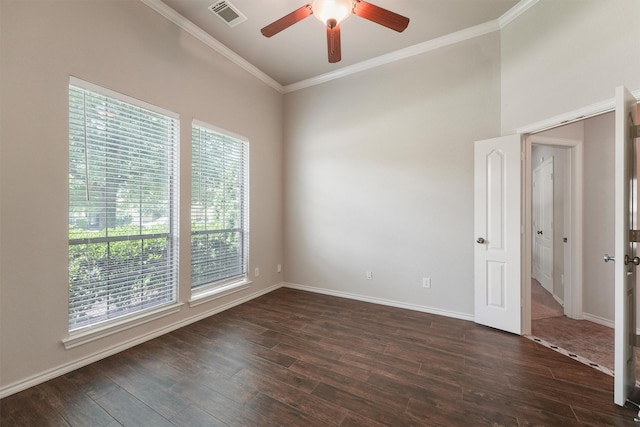 527 Oak Ridge Grove Cir, Spring, TX 77386 - spare room with ornamental molding, ceiling fan, dark wood-style floors, and baseboards