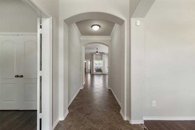 527 Oak Ridge Grove Cir, Spring, TX 77386 - hallway featuring arched walkways, crown molding, and baseboards