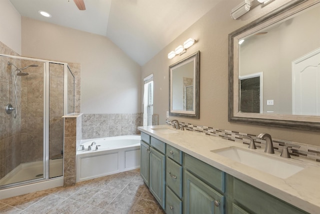 527 Oak Ridge Grove Cir, Spring, TX 77386 - full bathroom with a shower stall, a garden tub, lofted ceiling, double vanity, and tile patterned flooring