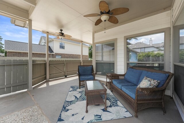 527 Oak Ridge Grove Cir, Spring, TX 77386 - sunroom with ceiling fan and an outdoor hangout area