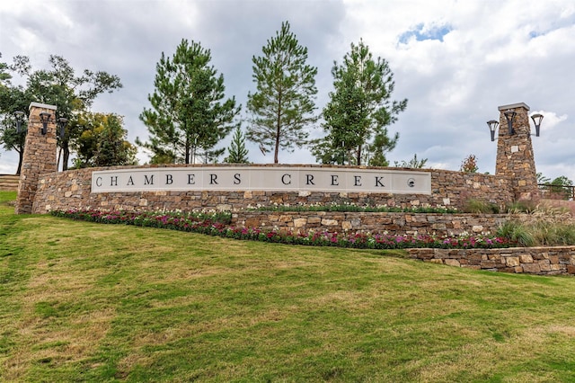 14615 Cedar Elm Ct, Willis, TX 77318 - community sign with a lawn