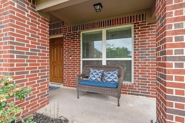 9931 Chimney Swift Ln, Conroe, TX 77385 - entrance to property featuring brick siding and covered porch