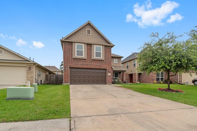 9931 Chimney Swift Ln, Conroe, TX 77385 - traditional home featuring brick siding, an attached garage, and concrete driveway