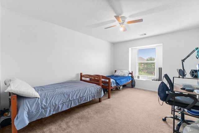 9931 Chimney Swift Ln, Conroe, TX 77385 - carpeted bedroom with a ceiling fan
