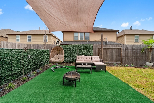 9931 Chimney Swift Ln, Conroe, TX 77385 - view of yard with an outdoor living space with a fire pit