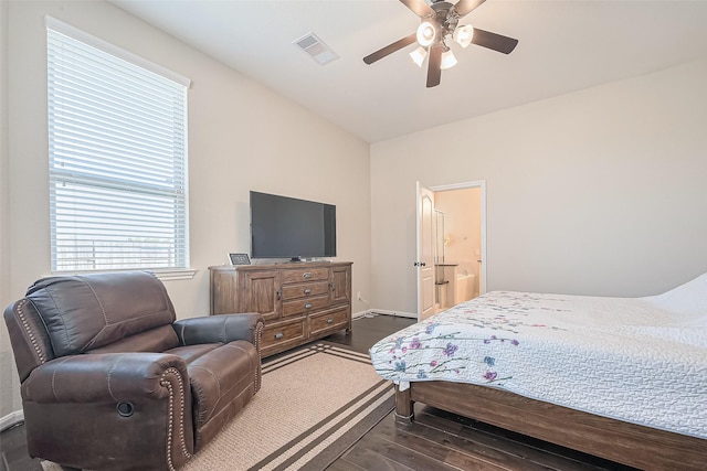 16742 Highland Country Dr, Cypress, TX 77433 - bedroom with dark wood finished floors, a ceiling fan, baseboards, and connected bathroom