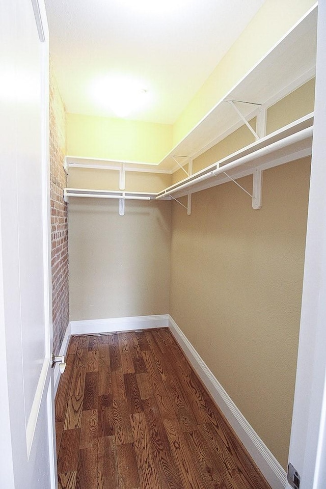 2207 Postoffice St Unit 208, Galveston, TX 77550 - spacious closet featuring wood finished floors