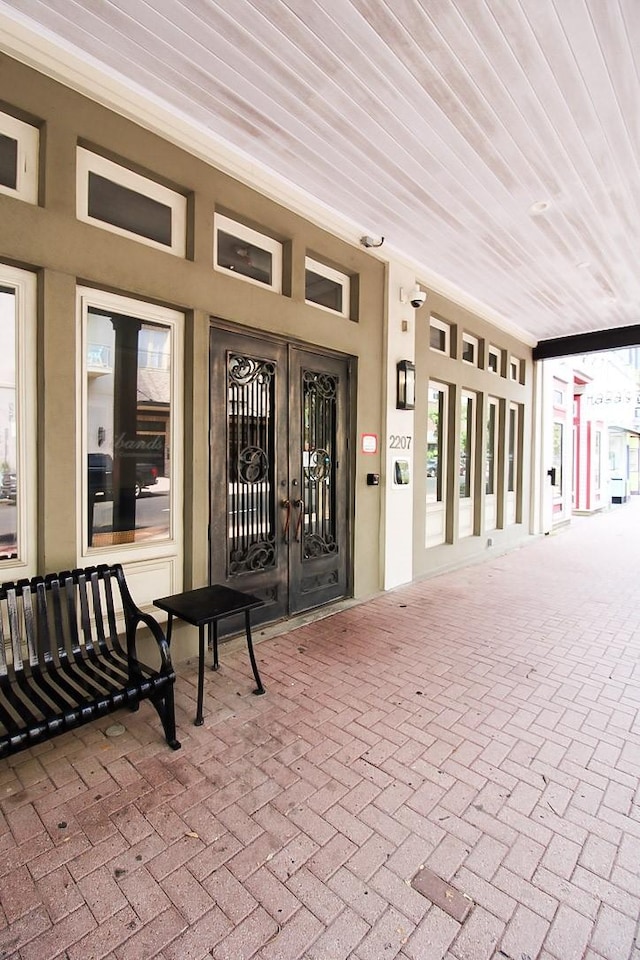 2207 Postoffice St Unit 208, Galveston, TX 77550 - doorway to property with french doors