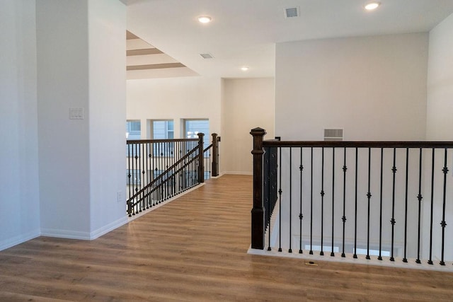 15842 Formaston Forest Dr, Humble, TX 77346 - hall featuring an upstairs landing, wood finished floors, baseboards, and recessed lighting