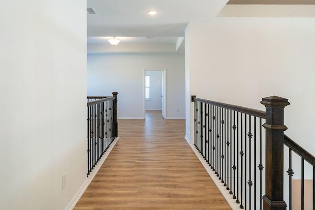 15842 Formaston Forest Dr, Humble, TX 77346 - hall featuring an upstairs landing, light wood finished floors, baseboards, and recessed lighting