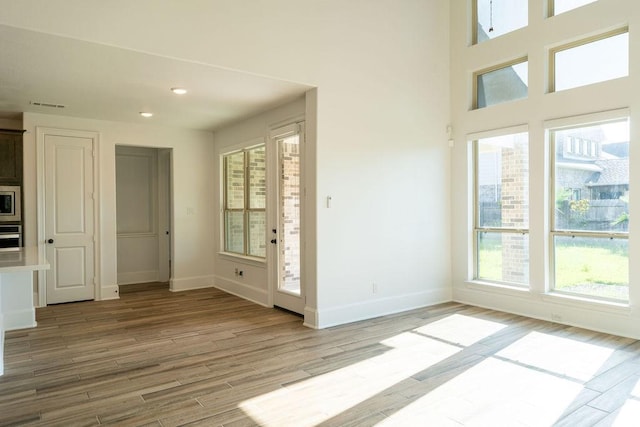 15842 Formaston Forest Dr, Humble, TX 77346 - spare room with baseboards, light wood-style flooring, and recessed lighting