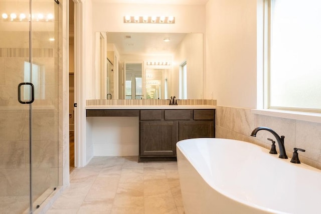 15842 Formaston Forest Dr, Humble, TX 77346 - full bathroom with a freestanding bath, a shower stall, and vanity