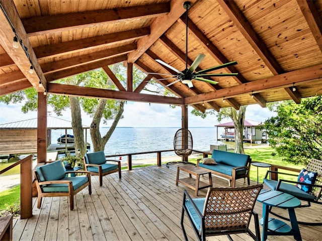 246 Indian Falls Ln, Livingston, TX 77351 - wooden deck with a water view, outdoor lounge area, and ceiling fan